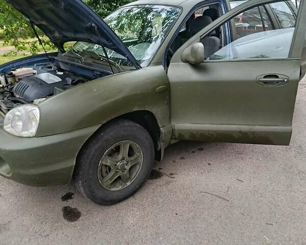 Зеленый Хендай Санта Фе, объемом двигателя 2.4 л и пробегом 225 тыс. км за 3000 $, фото 6 на Automoto.ua