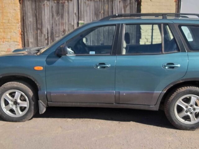 Зеленый Хендай Санта Фе, объемом двигателя 2 л и пробегом 125 тыс. км за 2999 $, фото 4 на Automoto.ua