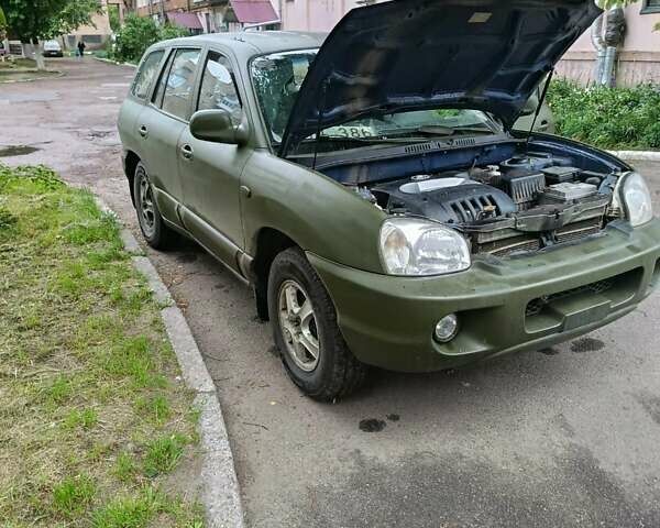 Зеленый Хендай Санта Фе, объемом двигателя 2.4 л и пробегом 225 тыс. км за 3000 $, фото 14 на Automoto.ua