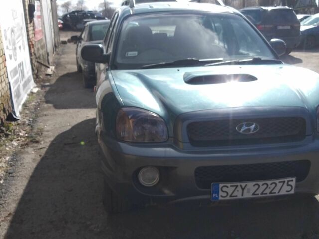 Зеленый Хендай Санта Фе, объемом двигателя 2 л и пробегом 125 тыс. км за 2999 $, фото 3 на Automoto.ua