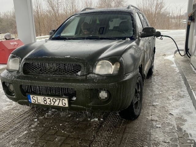 Зелений Хендай Санта Фе, об'ємом двигуна 2 л та пробігом 280 тис. км за 2391 $, фото 3 на Automoto.ua