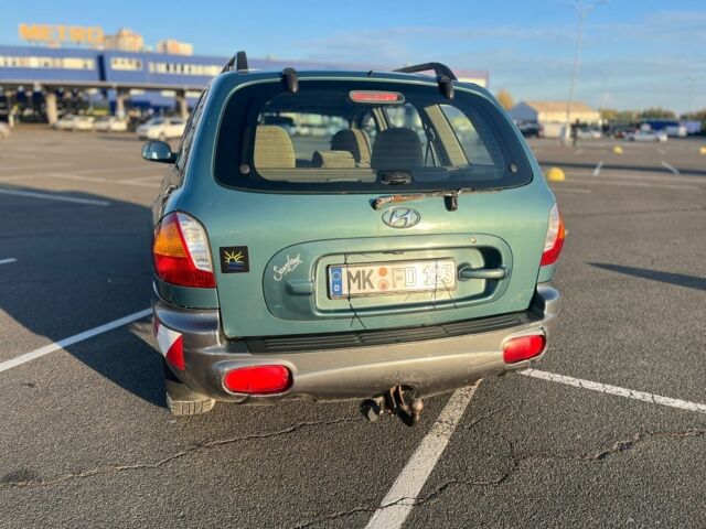 Зелений Хендай Санта Фе, об'ємом двигуна 2 л та пробігом 126 тис. км за 3000 $, фото 7 на Automoto.ua