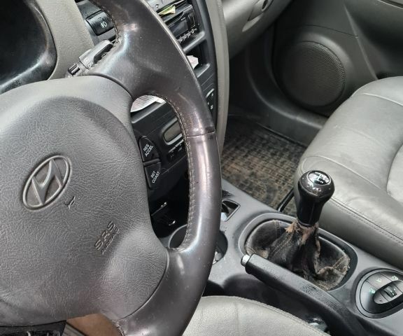 Зеленый Хендай Санта Фе, объемом двигателя 2 л и пробегом 284 тыс. км за 2900 $, фото 5 на Automoto.ua