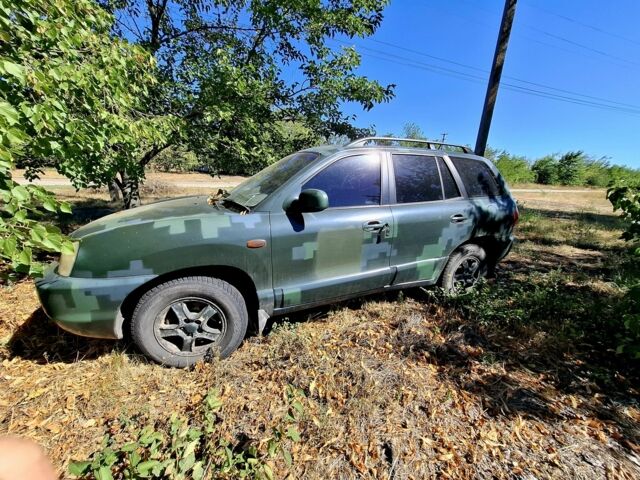 Зеленый Хендай Санта Фе, объемом двигателя 2.7 л и пробегом 250 тыс. км за 3100 $, фото 1 на Automoto.ua