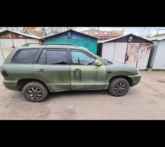 Зеленый Хендай Санта Фе, объемом двигателя 2 л и пробегом 284 тыс. км за 2900 $, фото 2 на Automoto.ua