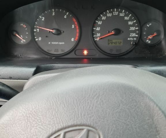 Зеленый Хендай Санта Фе, объемом двигателя 2 л и пробегом 284 тыс. км за 2900 $, фото 6 на Automoto.ua