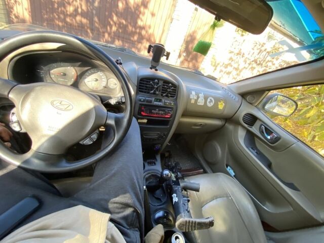 Зелений Хендай Санта Фе, об'ємом двигуна 2 л та пробігом 280 тис. км за 2391 $, фото 4 на Automoto.ua