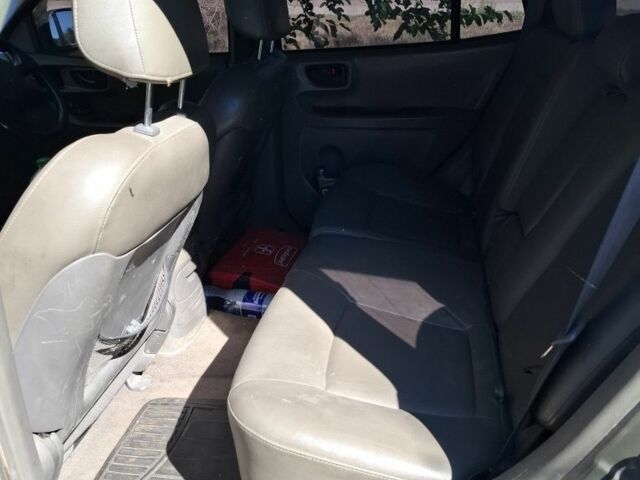 Зеленый Хендай Санта Фе, объемом двигателя 2.7 л и пробегом 250 тыс. км за 3100 $, фото 4 на Automoto.ua