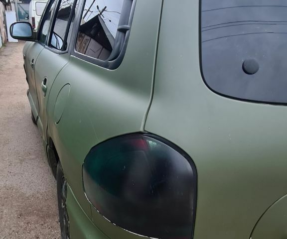 Зеленый Хендай Санта Фе, объемом двигателя 2 л и пробегом 284 тыс. км за 2900 $, фото 3 на Automoto.ua