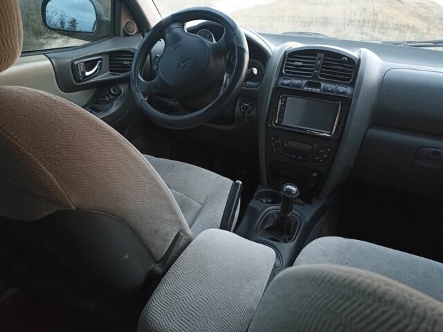 Зеленый Хендай Санта Фе, объемом двигателя 2 л и пробегом 336 тыс. км за 3500 $, фото 5 на Automoto.ua