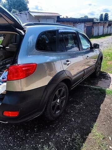 Зеленый Хендай Санта Фе, объемом двигателя 3.3 л и пробегом 195 тыс. км за 7800 $, фото 3 на Automoto.ua