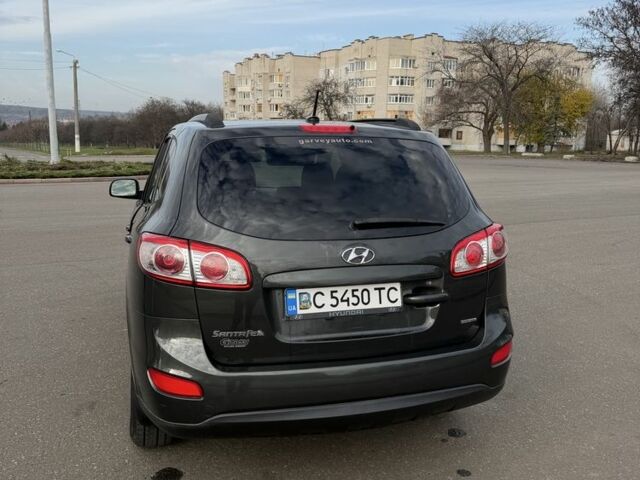 Зеленый Хендай Санта Фе, объемом двигателя 2.4 л и пробегом 180 тыс. км за 9800 $, фото 5 на Automoto.ua