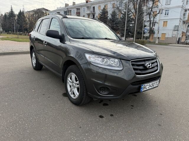 Зеленый Хендай Санта Фе, объемом двигателя 2.4 л и пробегом 180 тыс. км за 9800 $, фото 1 на Automoto.ua