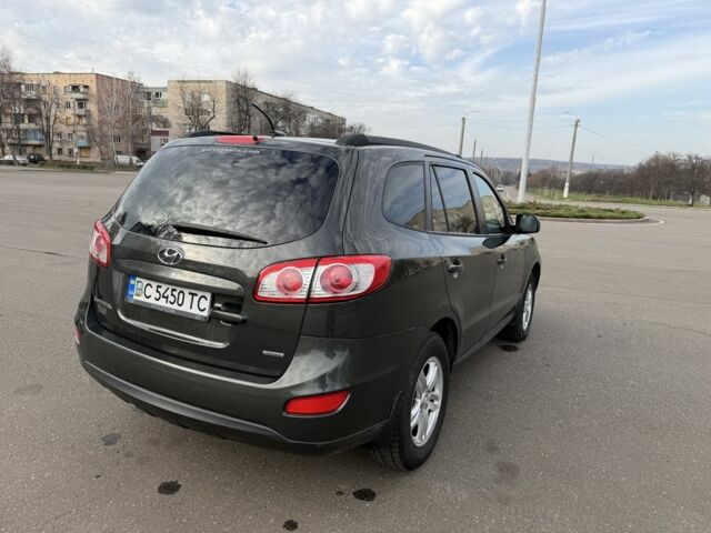 Зеленый Хендай Санта Фе, объемом двигателя 2.4 л и пробегом 180 тыс. км за 9800 $, фото 6 на Automoto.ua