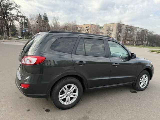 Зеленый Хендай Санта Фе, объемом двигателя 2.4 л и пробегом 180 тыс. км за 9800 $, фото 7 на Automoto.ua