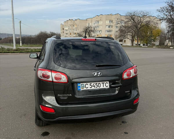 Зеленый Хендай Санта Фе, объемом двигателя 2.36 л и пробегом 180 тыс. км за 9800 $, фото 5 на Automoto.ua