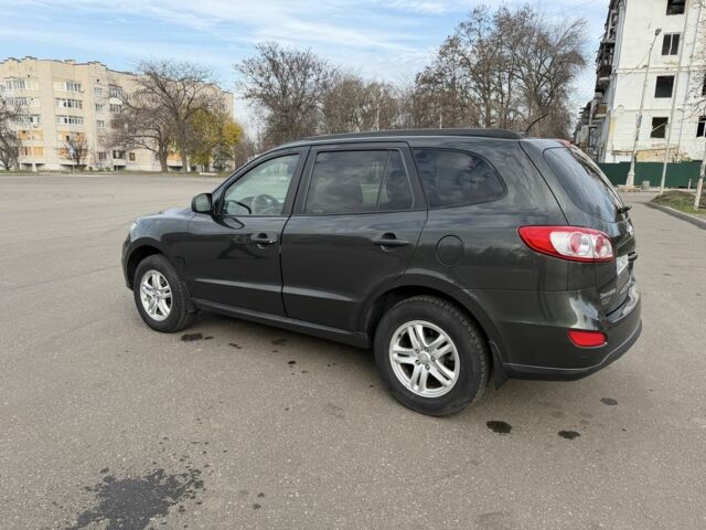 Зеленый Хендай Санта Фе, объемом двигателя 2.4 л и пробегом 180 тыс. км за 9800 $, фото 4 на Automoto.ua