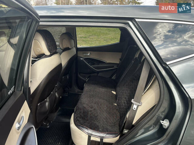 Зеленый Хендай Санта Фе, объемом двигателя 2.4 л и пробегом 211 тыс. км за 13000 $, фото 2 на Automoto.ua