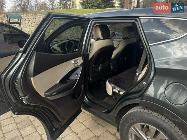 Зеленый Хендай Санта Фе, объемом двигателя 2.4 л и пробегом 211 тыс. км за 13000 $, фото 1 на Automoto.ua