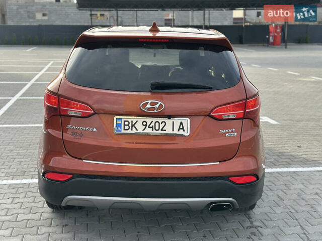 Оранжевый Хендай Санта Фе, объемом двигателя 2.4 л и пробегом 208 тыс. км за 15800 $, фото 9 на Automoto.ua