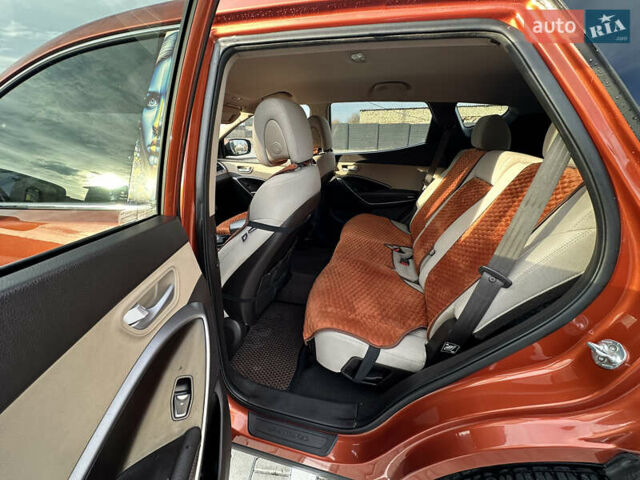 Оранжевый Хендай Санта Фе, объемом двигателя 2.4 л и пробегом 208 тыс. км за 15800 $, фото 13 на Automoto.ua