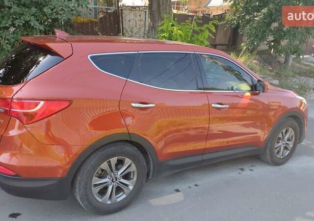 Оранжевый Хендай Санта Фе, объемом двигателя 2.4 л и пробегом 90 тыс. км за 14000 $, фото 3 на Automoto.ua