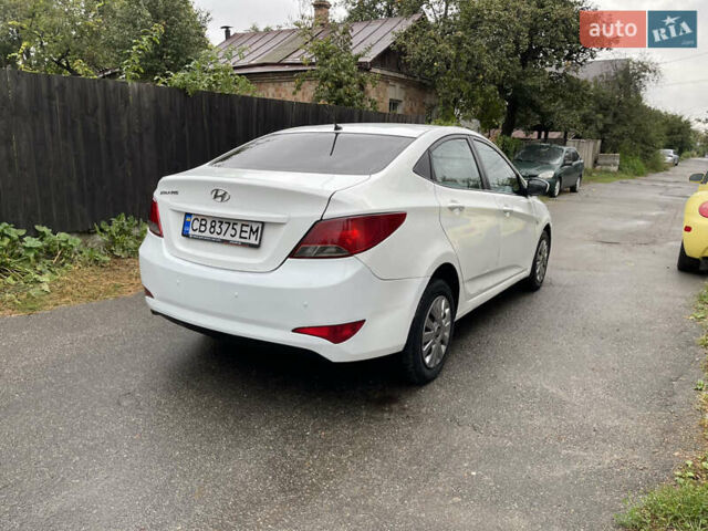 Белый Хендай Соларис, объемом двигателя 1.59 л и пробегом 250 тыс. км за 5200 $, фото 10 на Automoto.ua