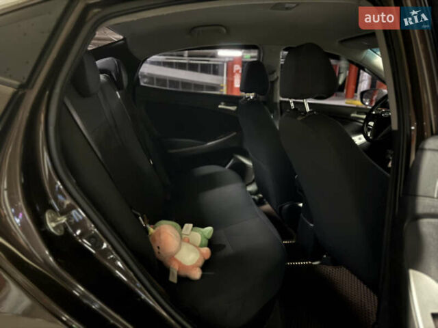 Коричневый Хендай Соларис, объемом двигателя 1.59 л и пробегом 230 тыс. км за 8200 $, фото 14 на Automoto.ua