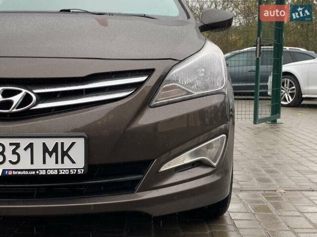 Коричневый Хендай Соларис, объемом двигателя 1.6 л и пробегом 122 тыс. км за 11499 $, фото 6 на Automoto.ua