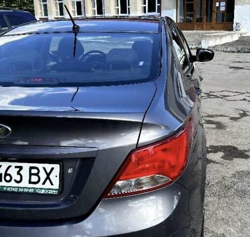 Серый Хендай Соларис, объемом двигателя 1.4 л и пробегом 38 тыс. км за 12500 $, фото 8 на Automoto.ua