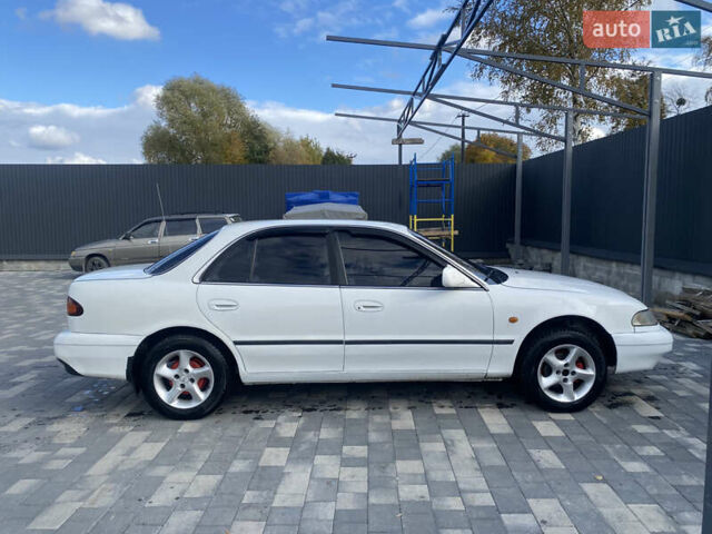 Белый Хендай Соната, объемом двигателя 2 л и пробегом 330 тыс. км за 1700 $, фото 2 на Automoto.ua