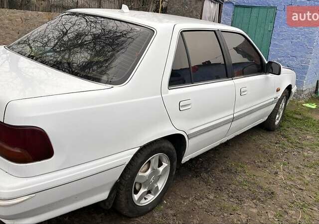 Белый Хендай Соната, объемом двигателя 2 л и пробегом 237 тыс. км за 1000 $, фото 5 на Automoto.ua