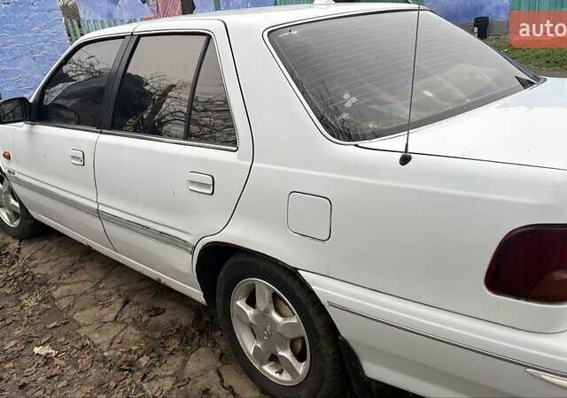 Белый Хендай Соната, объемом двигателя 2 л и пробегом 237 тыс. км за 1000 $, фото 3 на Automoto.ua