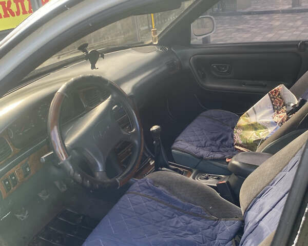 Белый Хендай Соната, объемом двигателя 2 л и пробегом 330 тыс. км за 1700 $, фото 7 на Automoto.ua