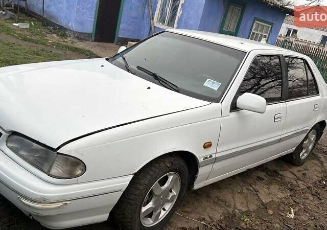 Белый Хендай Соната, объемом двигателя 2 л и пробегом 237 тыс. км за 1000 $, фото 1 на Automoto.ua