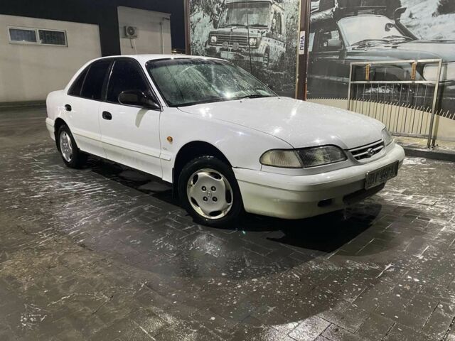 Білий Хендай Соната, об'ємом двигуна 2 л та пробігом 330 тис. км за 987 $, фото 20 на Automoto.ua