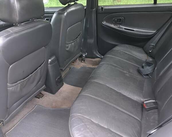 Белый Хендай Соната, объемом двигателя 2 л и пробегом 300 тыс. км за 1700 $, фото 7 на Automoto.ua