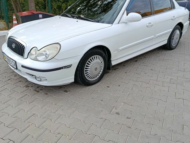 Белый Хендай Соната, объемом двигателя 2 л и пробегом 270 тыс. км за 2799 $, фото 5 на Automoto.ua