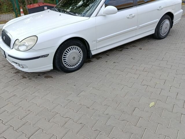 Белый Хендай Соната, объемом двигателя 2 л и пробегом 270 тыс. км за 2799 $, фото 4 на Automoto.ua
