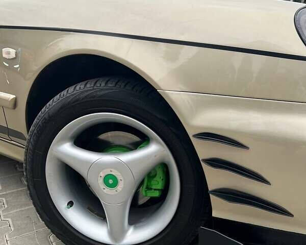 Бежевый Хендай Соната, объемом двигателя 2 л и пробегом 315 тыс. км за 4400 $, фото 8 на Automoto.ua