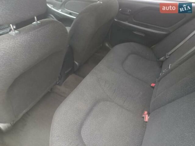 Бежевый Хендай Соната, объемом двигателя 2 л и пробегом 270 тыс. км за 1900 $, фото 2 на Automoto.ua