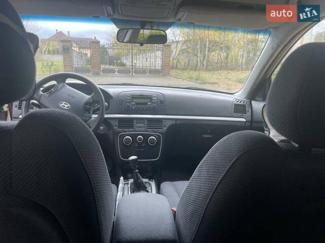 Бежевый Хендай Соната, объемом двигателя 2 л и пробегом 181 тыс. км за 4900 $, фото 12 на Automoto.ua