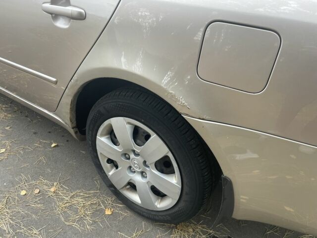 Бежевый Хендай Соната, объемом двигателя 2 л и пробегом 181 тыс. км за 4900 $, фото 10 на Automoto.ua