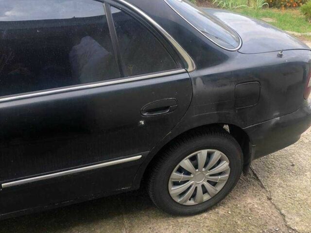 Черный Хендай Соната, объемом двигателя 2 л и пробегом 426 тыс. км за 2000 $, фото 3 на Automoto.ua