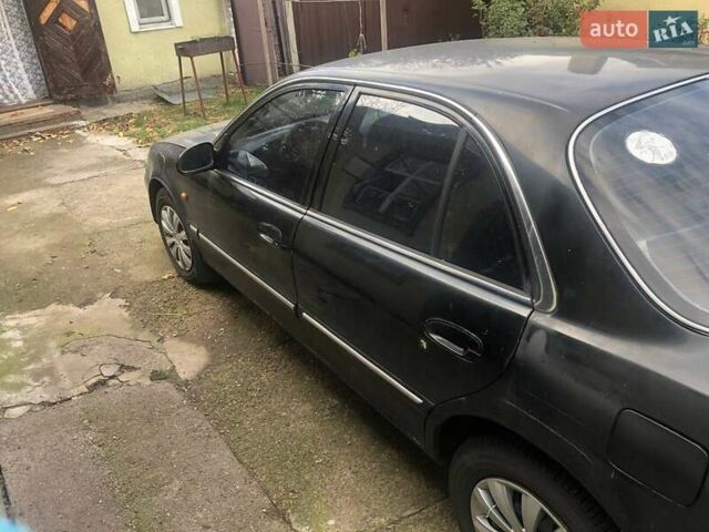 Чорний Хендай Соната, об'ємом двигуна 2 л та пробігом 400 тис. км за 2000 $, фото 5 на Automoto.ua