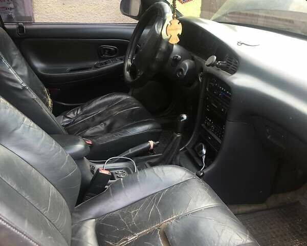 Чорний Хендай Соната, об'ємом двигуна 2 л та пробігом 400 тис. км за 2000 $, фото 2 на Automoto.ua