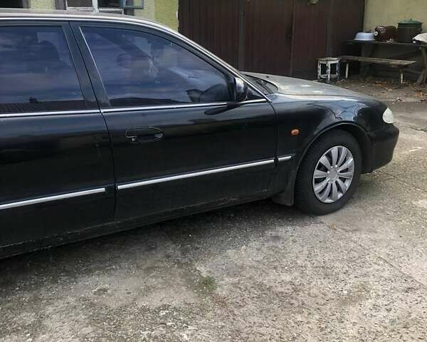 Чорний Хендай Соната, об'ємом двигуна 2 л та пробігом 400 тис. км за 2000 $, фото 9 на Automoto.ua