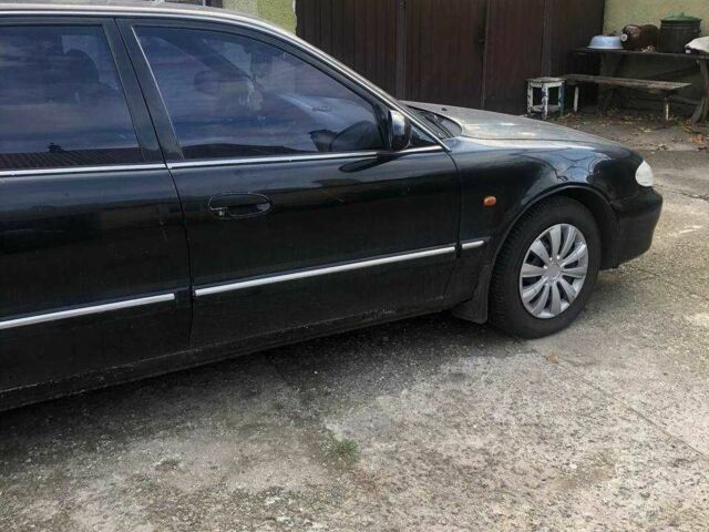 Черный Хендай Соната, объемом двигателя 2 л и пробегом 426 тыс. км за 2000 $, фото 5 на Automoto.ua