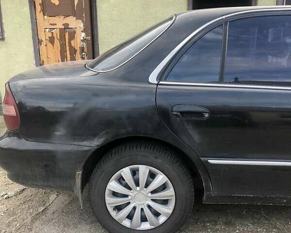 Чорний Хендай Соната, об'ємом двигуна 2 л та пробігом 400 тис. км за 2000 $, фото 8 на Automoto.ua