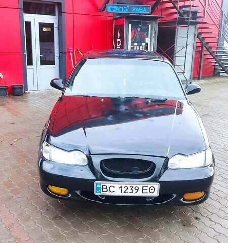 Черный Хендай Соната, объемом двигателя 2 л и пробегом 200 тыс. км за 1350 $, фото 10 на Automoto.ua